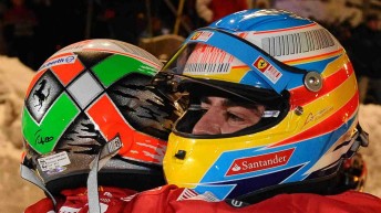 Fernando Alonso hugs kart race winner Giancarlo Fisichella