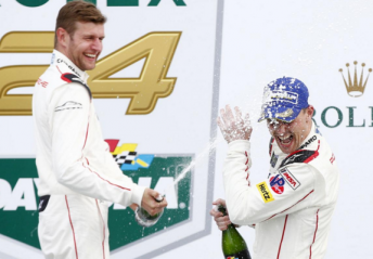 Bamber (right) celebrates with co-driver Daniel Christensen