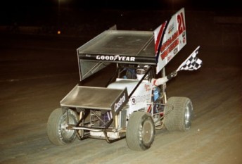 Garry Brazier celebrating his Australian title win at Speedway City in 2000