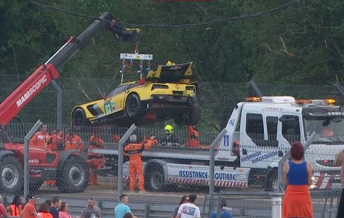 The #63 Corvette being removed from the accident site