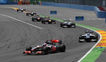 Jenson Button leads a pack of cars at last week