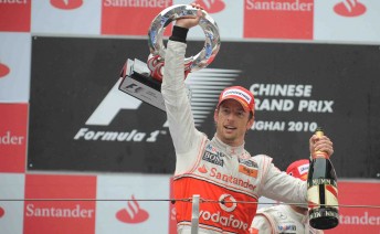 Jenson Button celebrates on the Chinese Grand Prix podium