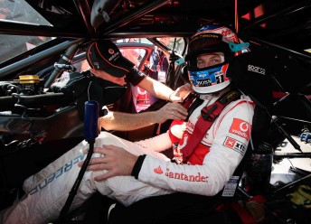 Jenson Button inside the TeamVodafone Commodore VE at Albert Park last March. His Bathurst laps next month will be the second time he has driven a V8 Supercar