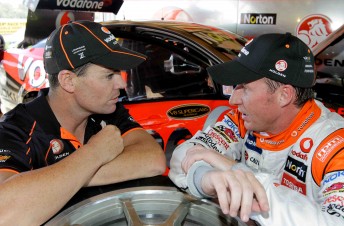Craig Lowndes talks with Mark Skaife, who drove Lowndes