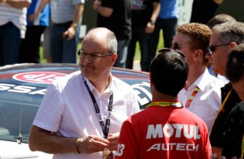 Tony Cochrane on the grid with Nissan officials and V8 Supercars CEO at the 2012 Clipsal 500