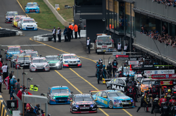 Packs form behind Michael Caruso and Tim Blanchard after they slowed on the way into pitlane under Safety Car in Sydney