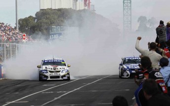 James Courtney performs a burnout on the front straight at Sydney