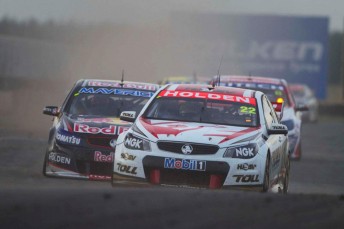 James Courtney holds out championship leader Jamie Whincup at Symmons Plains