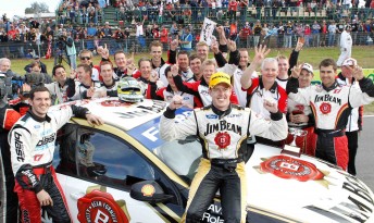 James Courtney and the Dick Johnson Racing team celebrates their fourth V8 win in a row