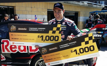 Craig Lowndes with his two Armor All Pole Awards