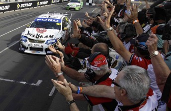 Jim Beam Racing celebrates as James Courtney crosses the finish line in Sydney