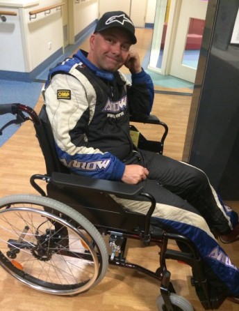 Darren Hossack in a wheelchair following the accident. pic via DPE Kart Technology