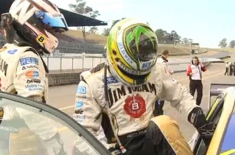 Warren Luff makes way for James Courtney in the #18 Jim Beam Racing Falcon at Eastern Creek today