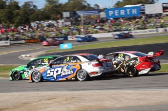Maro Engel fights with the Ford of David Reynolds and the Holden of James Courtney