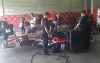 The McLaren Mercedes and V8 Supercar in the pits at Bathurst