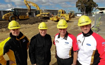 James Moffat, Allan Moffat, Dick Johnson and Steve Johnson stand in front of the construction work at Sandown Raceway