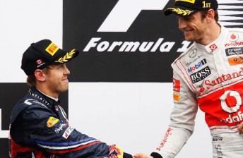 The two combatants grinned in different ways on the podium
