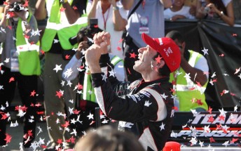 Helio Castroneves celebrates victory at Barber Motorsports Park