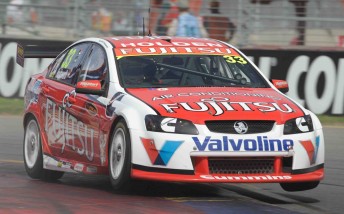 Lee Holdsworth bounds overt the first chicane kerb at the Clipsal 500