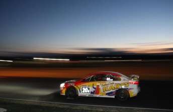 Holt and McLeod took victory as the light faded at Queensland Raceway