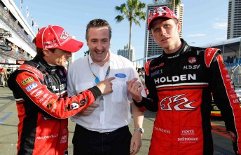 Take that Ford! Cameron McConville and Garth Tander in pitlane with Ford Motorsport manager Chris Styring