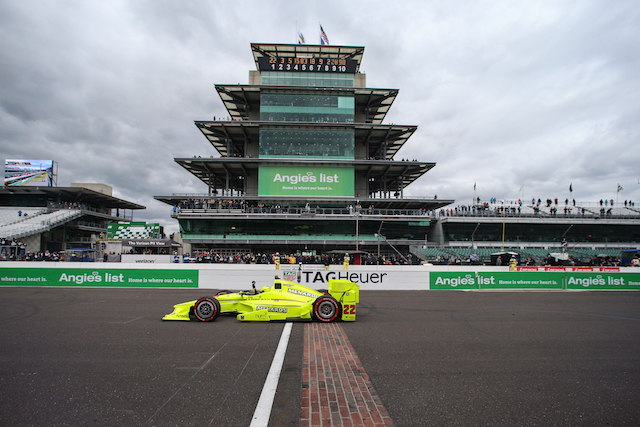 Simon Pagenaud salutes as he takes a third straight IndyCar victory