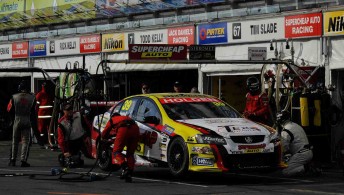 Russell Ingall completing a pit stop in his Supercheap Auto Commodore VE