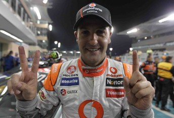 Jamie Whincup celebrates his second win at the Yas Mrina Circuit last weekend