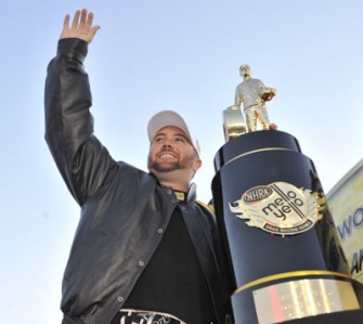 Shawn Langdon with his NHRA Top Fuel Championship trophy