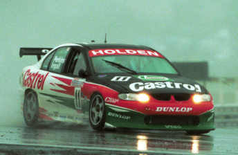 Larry Perkins and Russell Ingall on their way to victory in a rain-soaked Sandown 500 in 1998