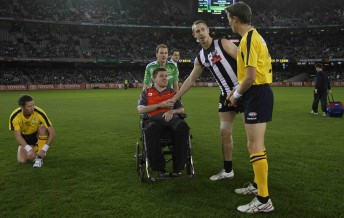 Nick Maxwell shakes hands with Lucas Dumbrell before the match