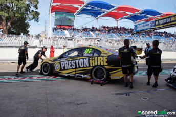 Grech (front) pushes the Team 18 Holden in the Adelaide pitlane