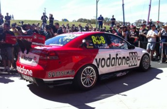 Media flocked around the retro-themed car in pitlane