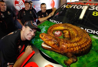 Craig Lowndes with his giant crocodile cake at Hidden Valley today