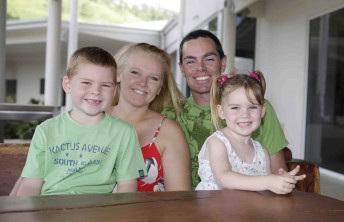 Craig Lowndes with his family Levi, Natalie and Chilli