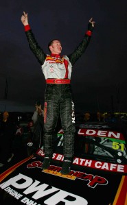 Greg Murphy stands on the bonnet of his Supercheap Auto-backed Commodore at Pukekohe in 2005 – his last V8 race win