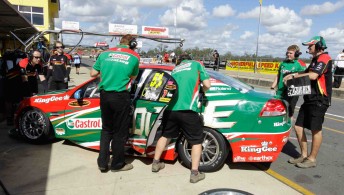 Barkley, far right, with the Castrol EDGE Commodore VE at Queensland Raceway