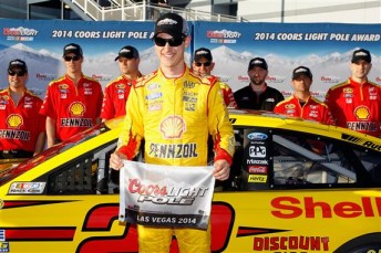 Joey Logano with the Coors Pole Award