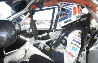 Neil Crompton behind the wheel during his final V8 Supercars season