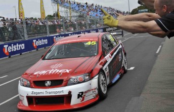 Steve Owen crosses the line to secure his second Fujitsu V8 Series
