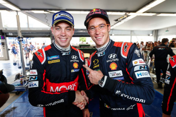 Paddon with Hyundai team leader Thierry Neuville