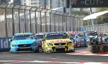 Holden and Volvo battle into the first chicane at Surfers Paradise