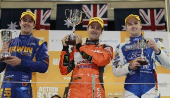 Alex Davison, Jamie Whincup and Mark Winterbottom celebrate their podium at Yas Marina