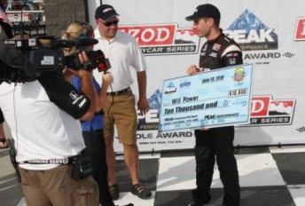 Will Power collects his pole cheque