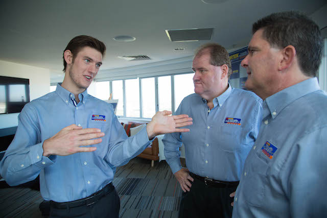 Brabham with team creator Brett Murray and Pirtek USA international executive director Glenn Duncan