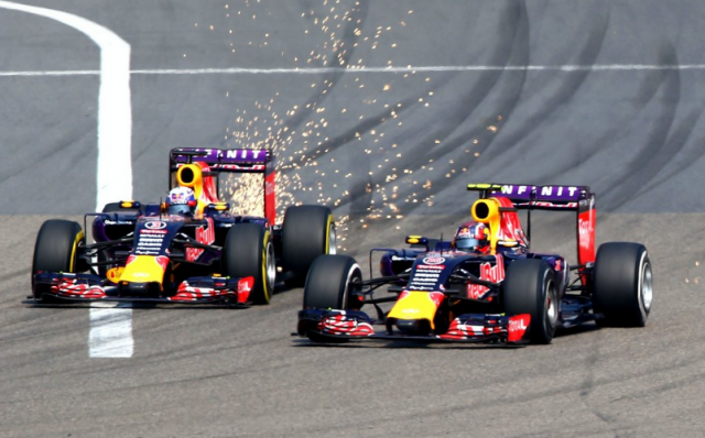 Sparks fly as Ricciardo attempts to pass Kvyat during the Chinese Grand Prix