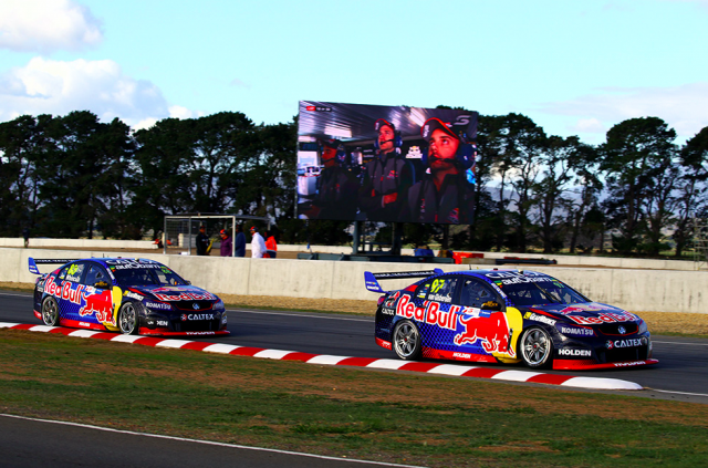 The Red Bull team watch on as Van Gisbergen leads Whincup