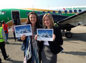 Reid and Dinsdale posing with photos of Nepal