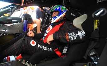 Roland Dane inside the TeamVodafone ride car at Queensland Raceway