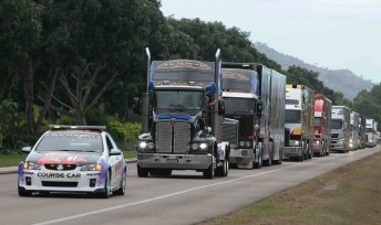 The course car leads the truck convoy through Townsville and its surrounding suburbs